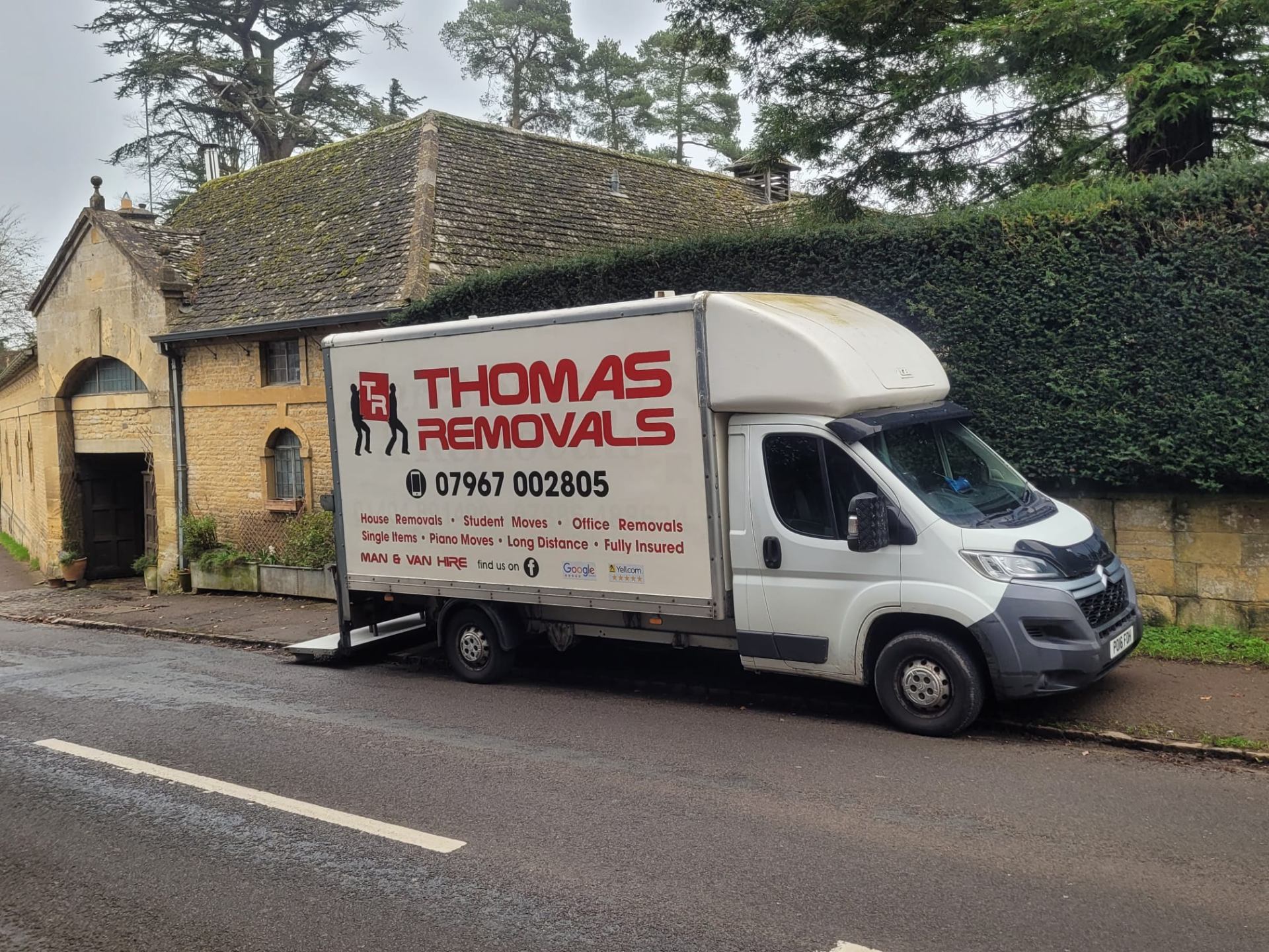 Thomas Removals van outside a Cotswolds property during a long-distance house move